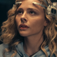 Chloë Grace Moretz wears a high-tech gaming headset.